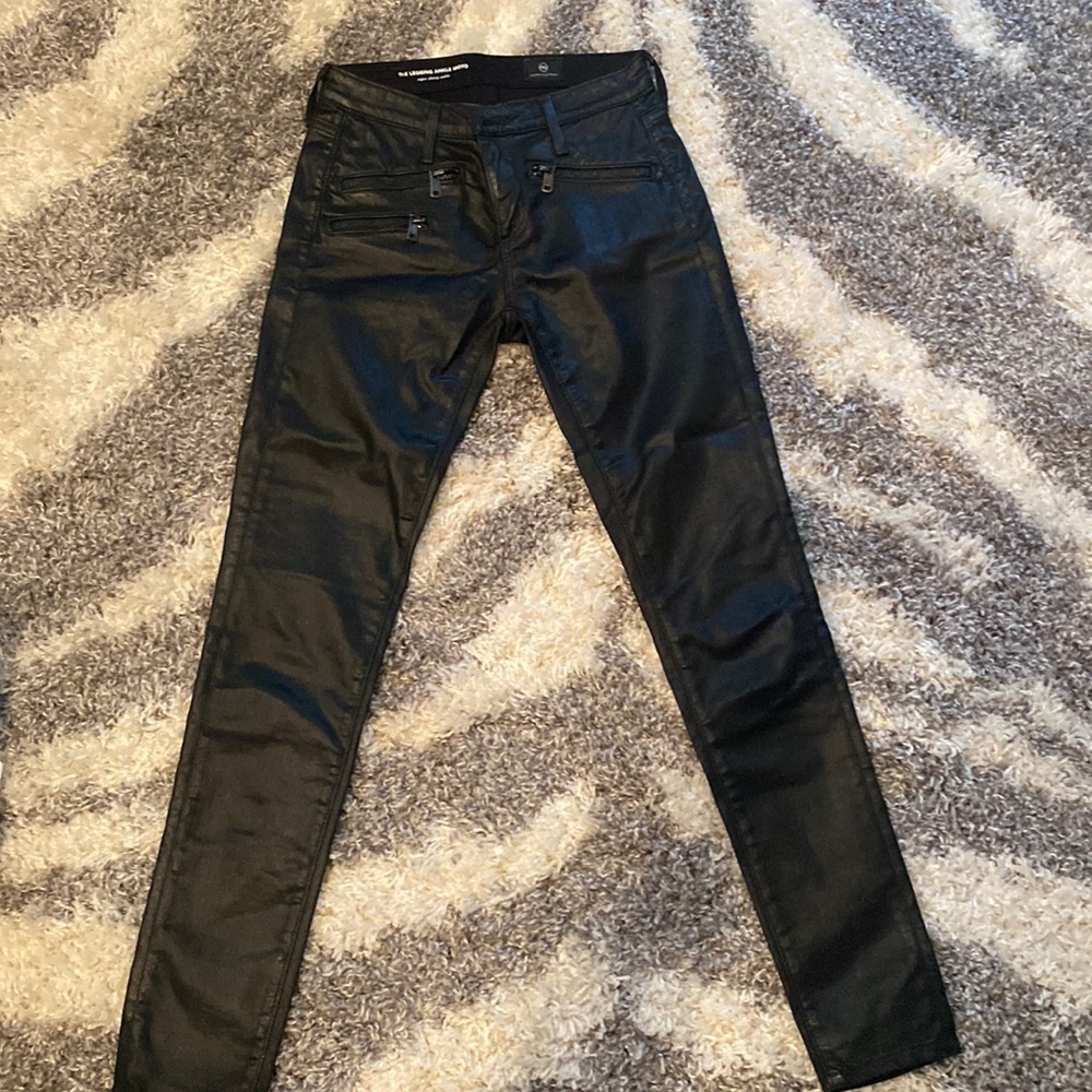 AG waxed black skinny moto jeans size 23R. Lightly used excellent condition.